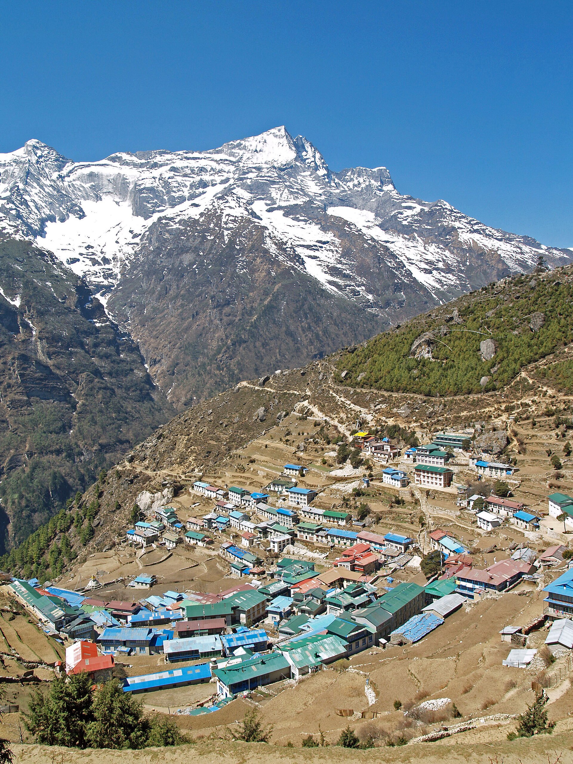 Namche Bazaar stacked up its hillside, the staging town for the Khumbu trails.